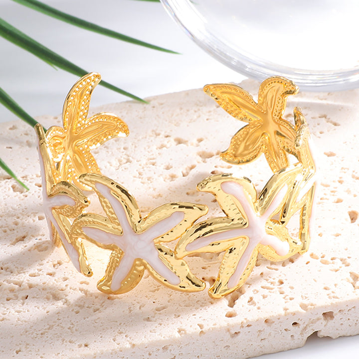 Women's Open Bangle with Striking Star Motif Nin Boutique