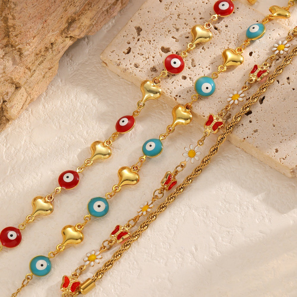 Ladies bracelet with elaborate pendants Nin Boutique