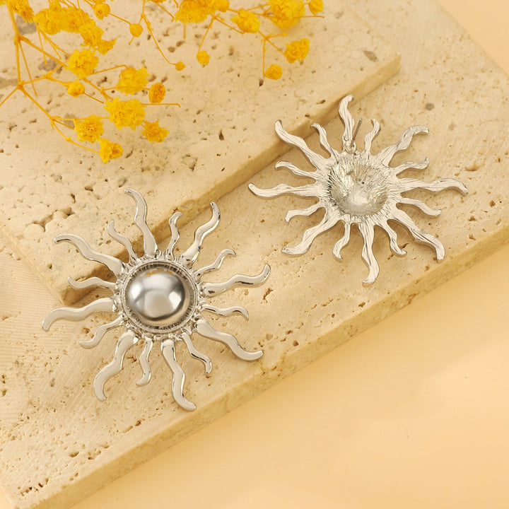 Ladies' earrings in artistic sun design Nin Boutique