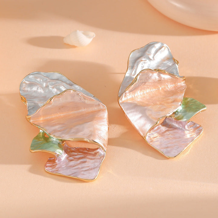 Ladies earrings in elaborate shell design Nin Boutique