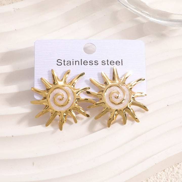 Ladies earrings in artistic sun motif Nin Boutique