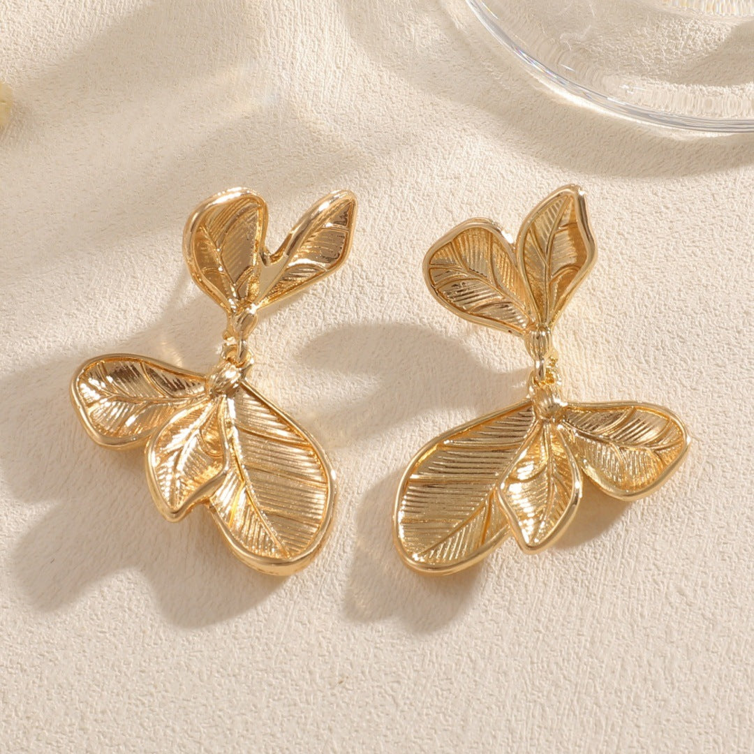 Ladies earrings in artistic leaf design Nin Boutique
