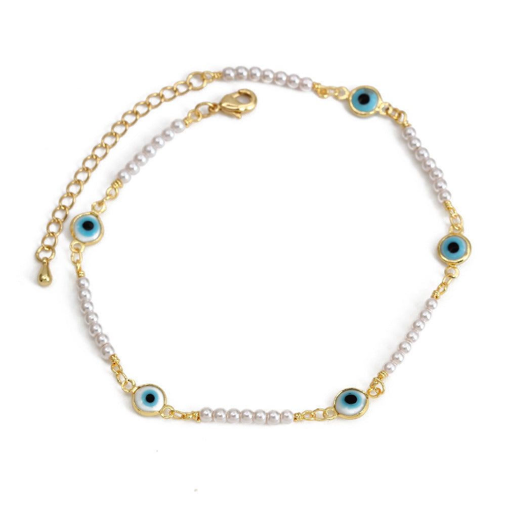 Women's ankle bracelet with protective eye and delicate pearl elements Nin Boutique