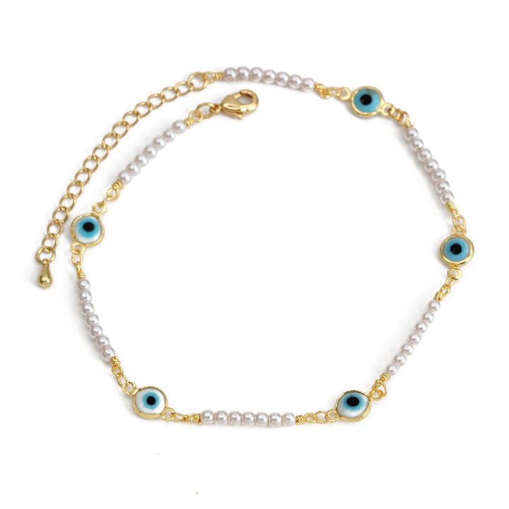 Women's ankle bracelet with protective eye and delicate pearl elements Nin Boutique