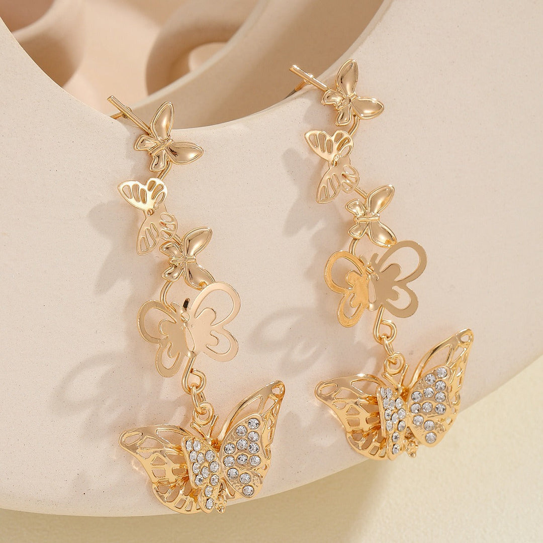 Ladies earrings with elaborate butterfly design Nin Boutique
