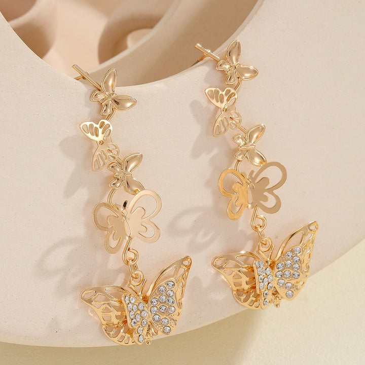 Ladies earrings with elaborate butterfly design Nin Boutique