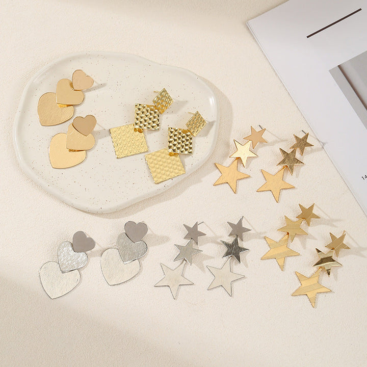 Ladies earrings in modern star design Nin Boutique