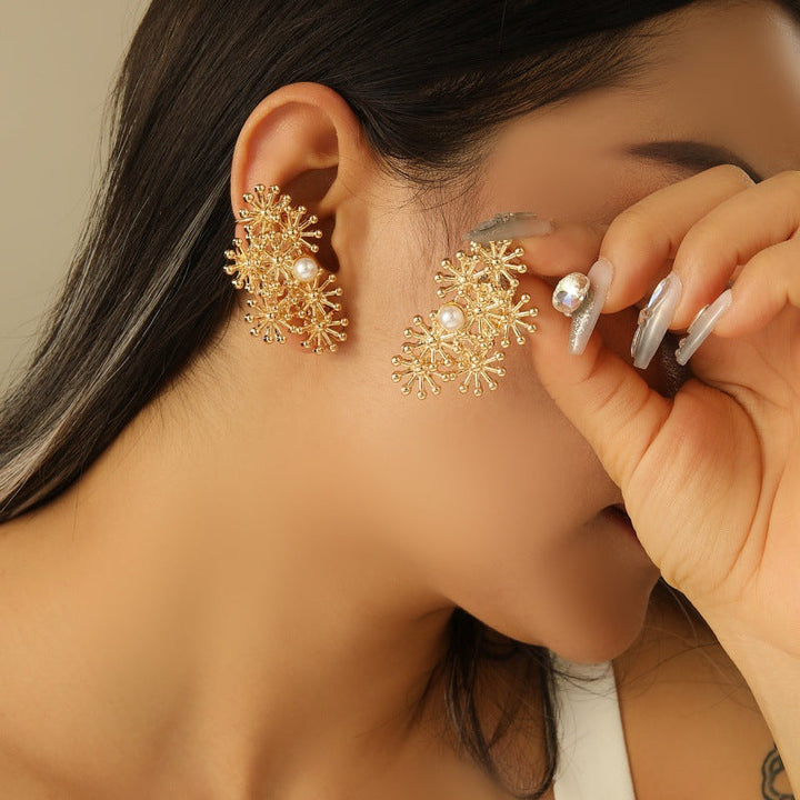 Women's earrings in luxurious floral pattern with pearl accents Nin Boutique