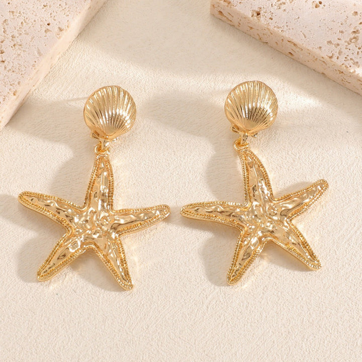 Women’s earrings in shell design Nin Boutique