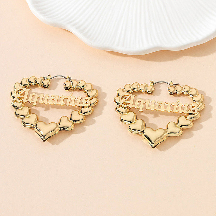 Women’s earrings with unique heart design and astrological element Nin Boutique