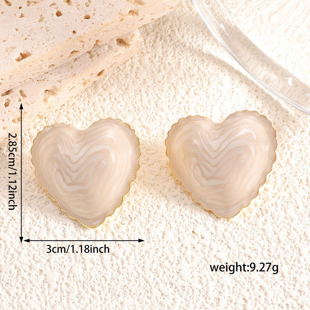 Women’s stud earrings with intricate heart design made of high-quality epoxy resin Nin Boutique