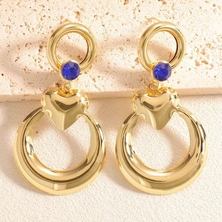 Ladies earrings with modern heart and ring design Nin Boutique