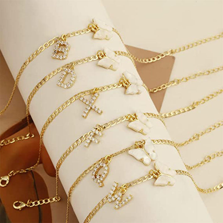 Ladies ankle bracelet with elegant glitter and butterfly charms Nin Boutique
