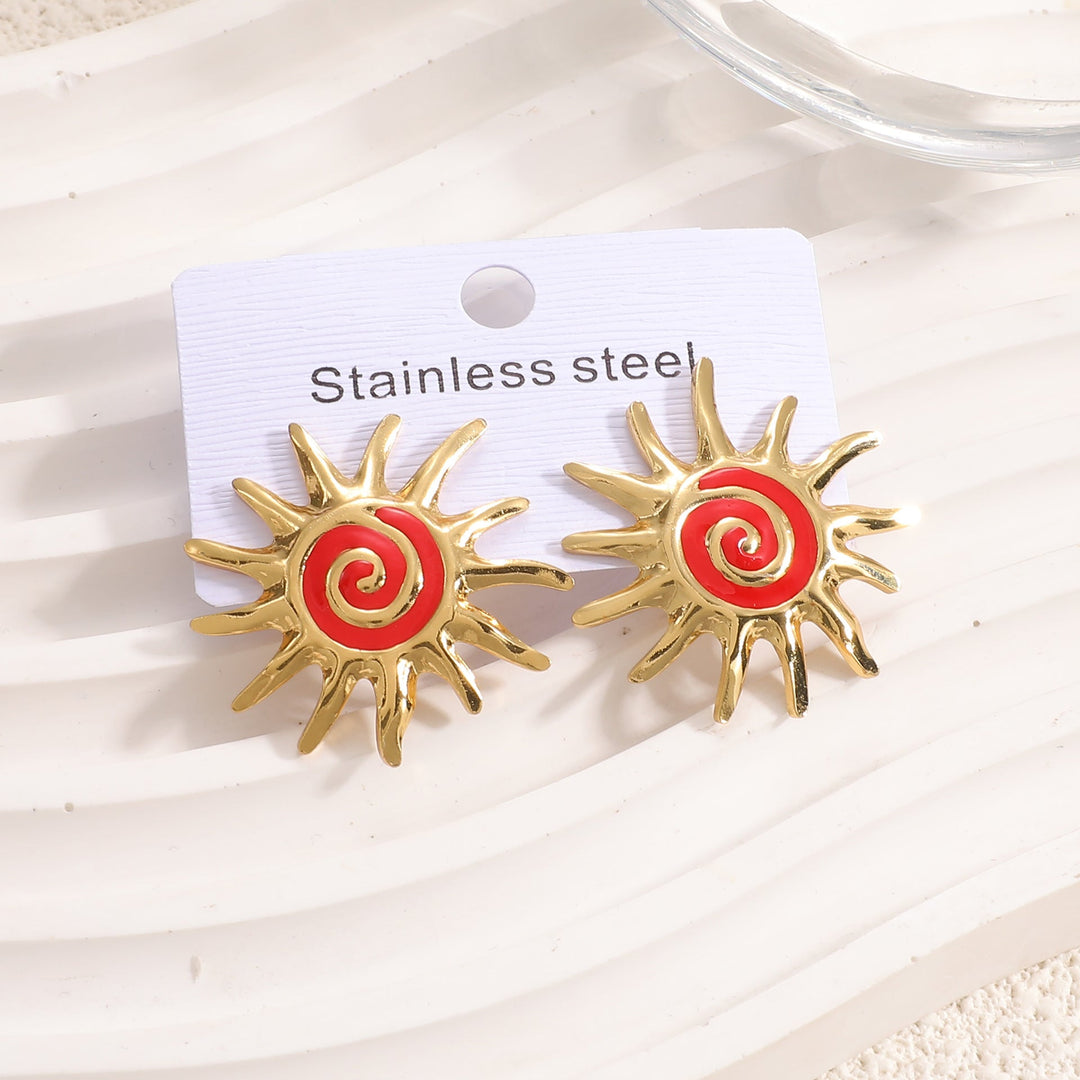 Ladies earrings in artistic sun motif Nin Boutique