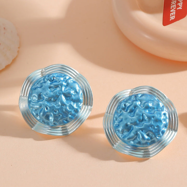 Women’s earrings in a modern, wave-shaped design Nin Boutique