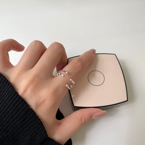 Women's ring in organic design with curved elements Nin Boutique