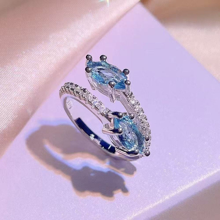 Women's adjustable marquise halo gemstone ring with pavé band Nin Boutique