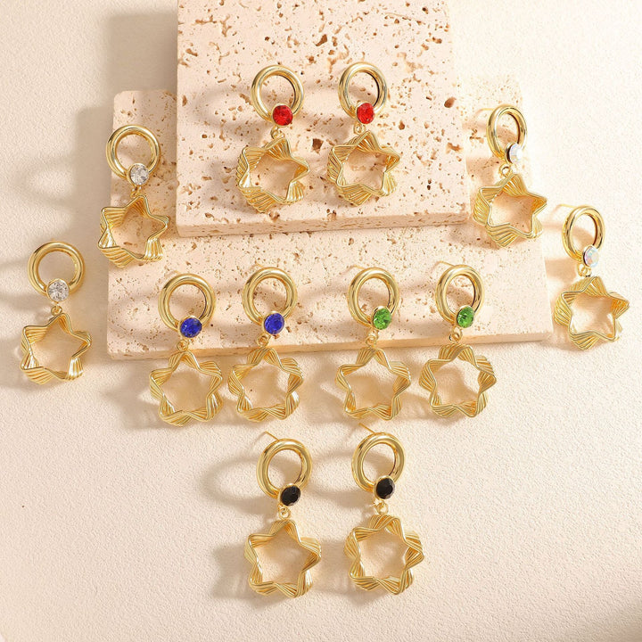 Ladies earrings with elaborate star design Nin Boutique