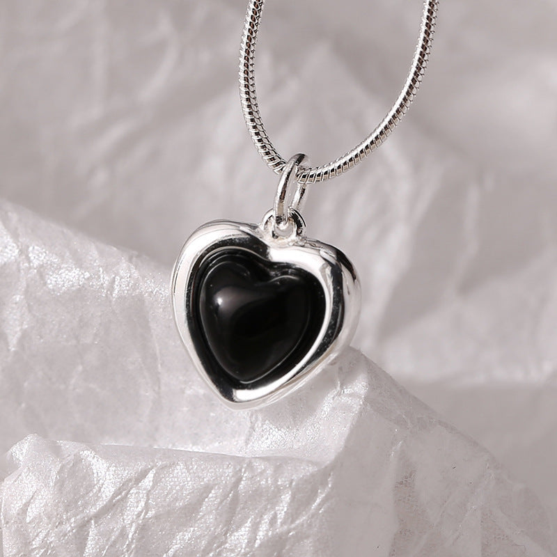 Women's necklace with heart-shaped pendant made of black onyx and fine silver Nin Boutique