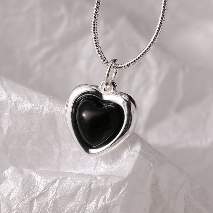 Women's necklace with heart-shaped pendant made of black onyx and fine silver Nin Boutique