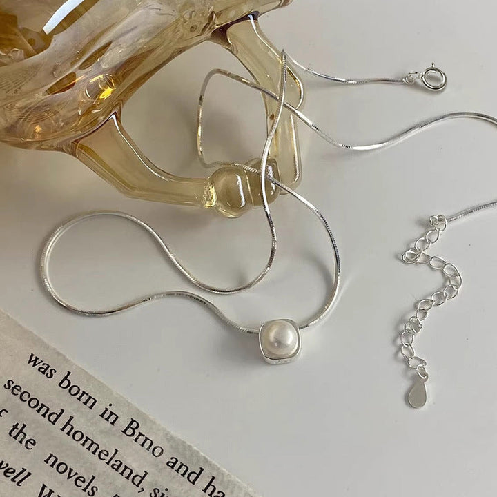 Women's necklace with timeless pearl pendant and elegant silver minimalism Nin Boutique