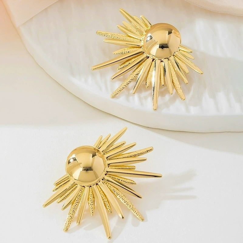 Ladies earrings in artistic sunbeam design Nin Boutique