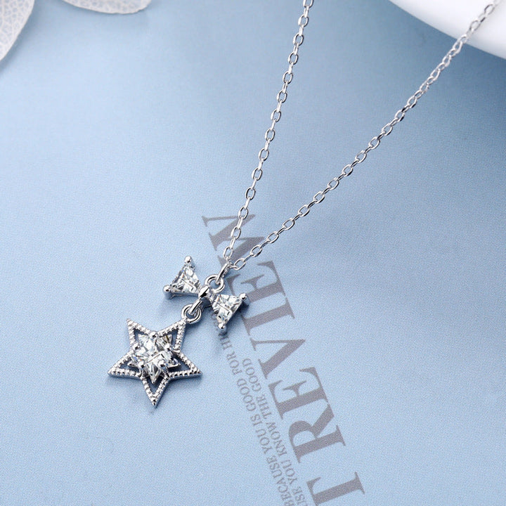 Women's necklace with sparkling star and bow pendant Nin Boutique