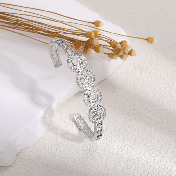 Women's bangle with artistic infinity symbol and sparkling zirconia Nin Boutique