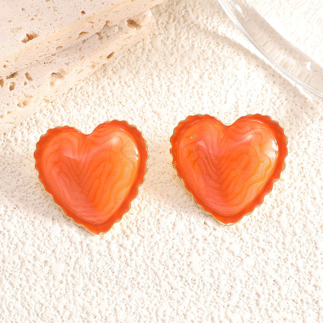 Women’s stud earrings with intricate heart design made of high-quality epoxy resin Nin Boutique