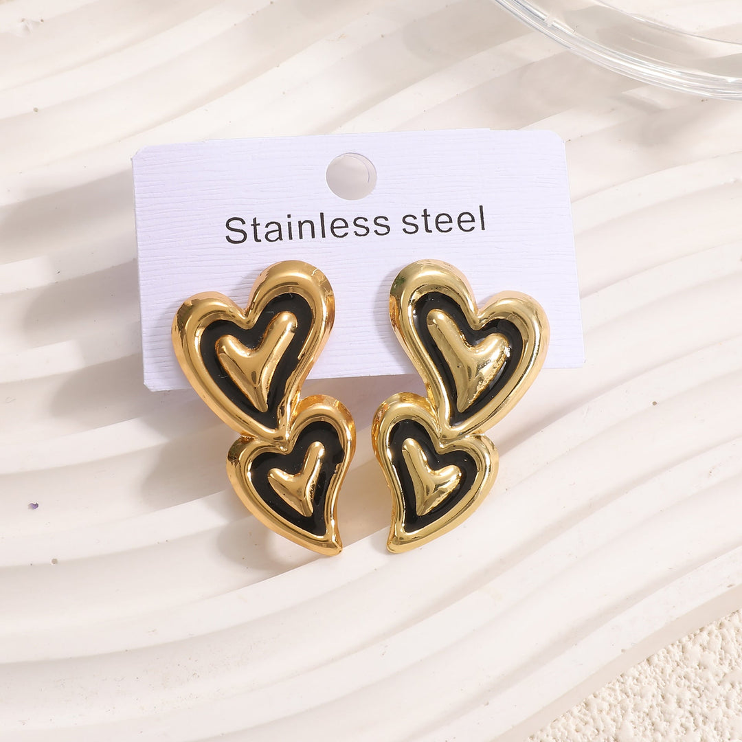Ladies earrings in playful heart design Nin Boutique