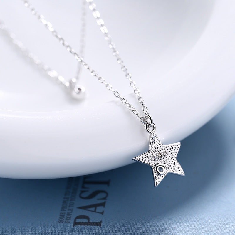 Women’s necklace with cheeky star pendant and sparkling detail Nin Boutique
