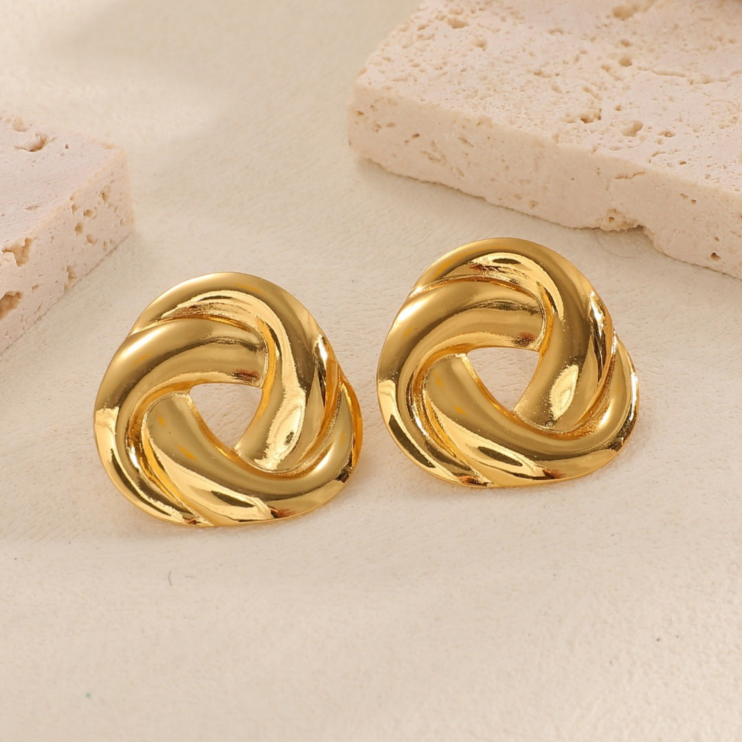 Ladies earrings with modern spiral pattern Nin Boutique