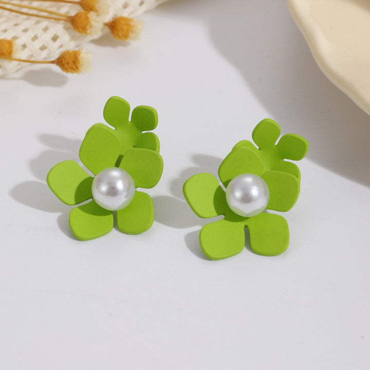Women’s earrings with artistic floral motif and pearl accent Nin Boutique