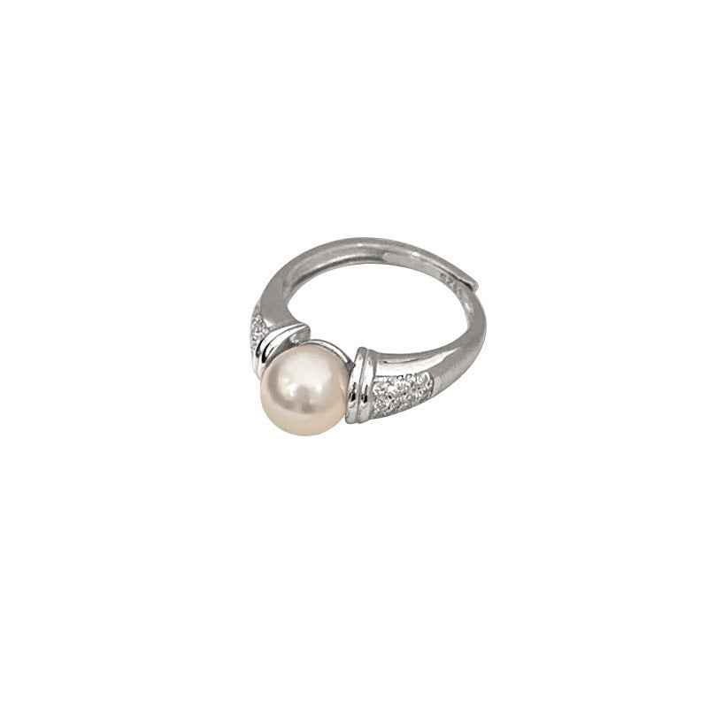 Women's elegant ring with shiny pearl and sparkling details Nin Boutique
