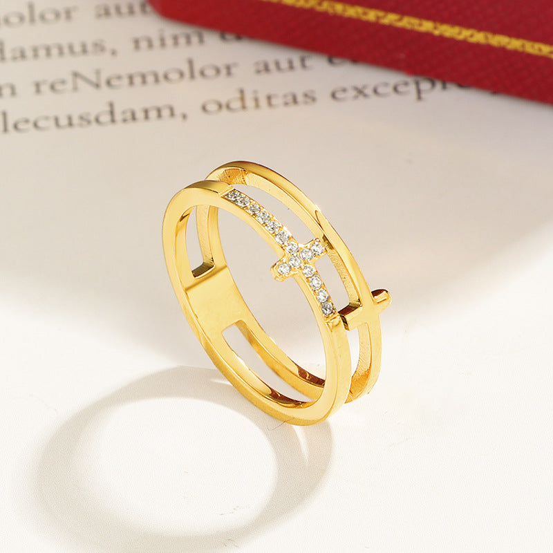 Women's ring with filigree cross design and sparkling zirconia stones Nin Boutique