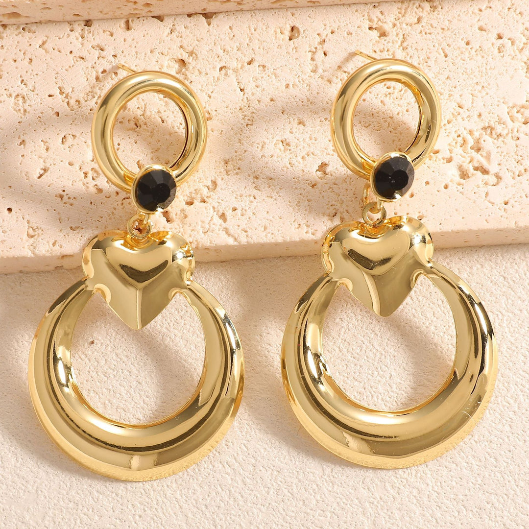Ladies earrings with modern heart and ring design Nin Boutique