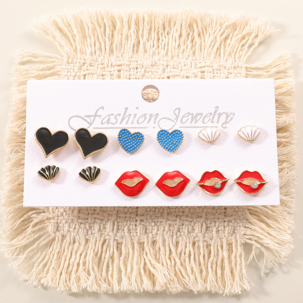Ladies earring set with playful animal and mushroom design Nin Boutique