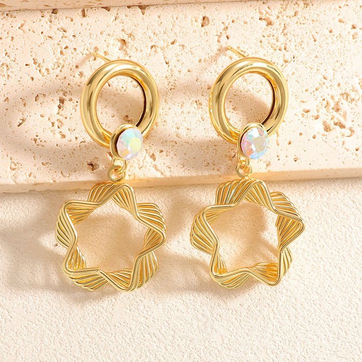 Ladies earrings with elaborate star design Nin Boutique