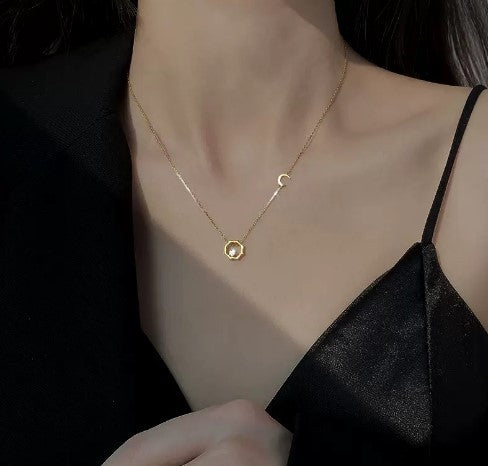 Women's necklace with delicate moon and flower pendant Nin Boutique