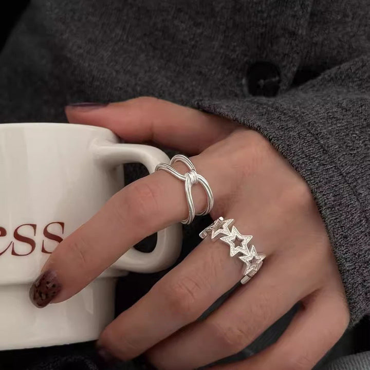 Women's ring with sparkling star motif made of high-quality stainless steel Nin Boutique