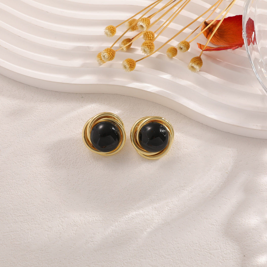 Women’s earrings with elaborate design and luminous accent Nin Boutique