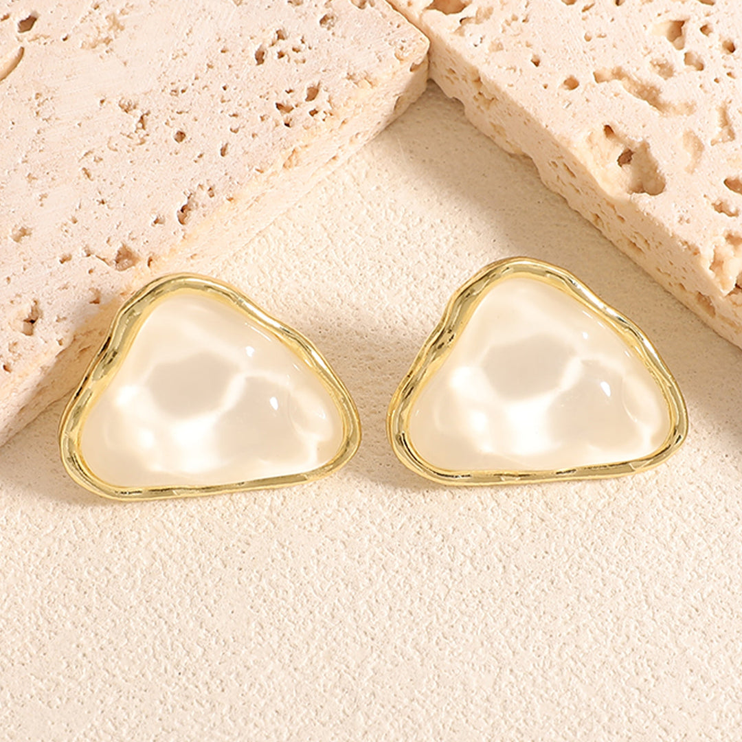 Women's stud earrings with intricate heart design Nin Boutique