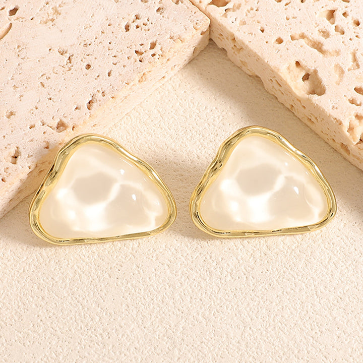 Women's stud earrings with intricate heart design Nin Boutique