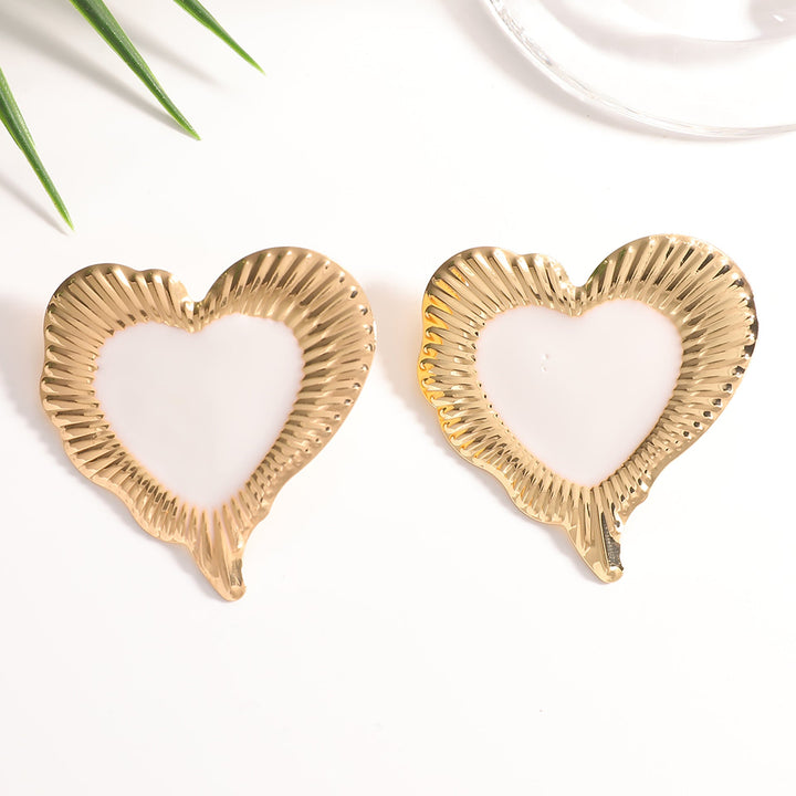 Ladies earrings in heart-shaped, glamorous design Nin Boutique