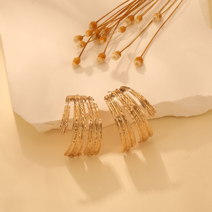 Women's earrings in unique, curved design Nin Boutique