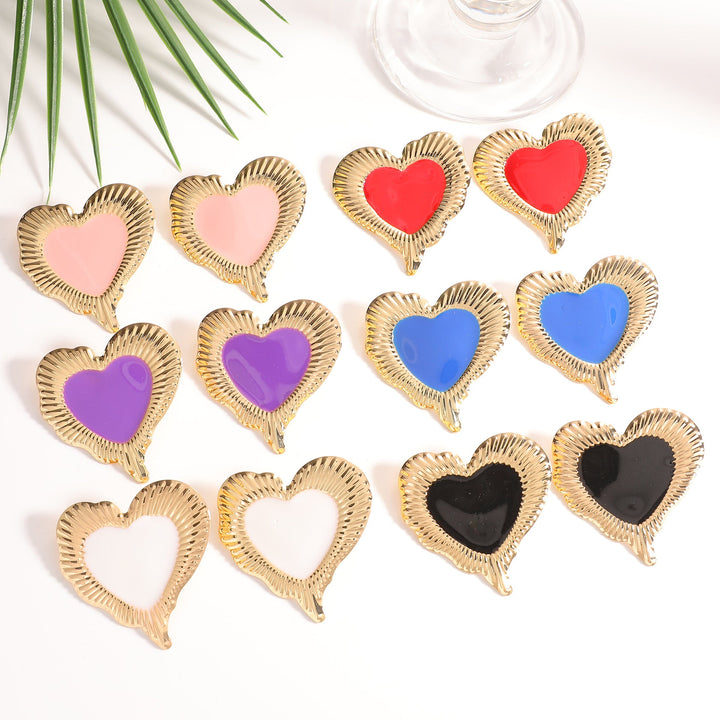 Ladies earrings in heart-shaped, glamorous design Nin Boutique