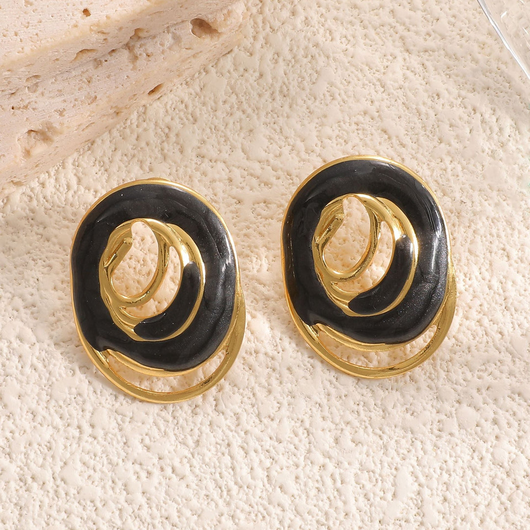 Women's earrings with artistically spiral-shaped design Nin Boutique