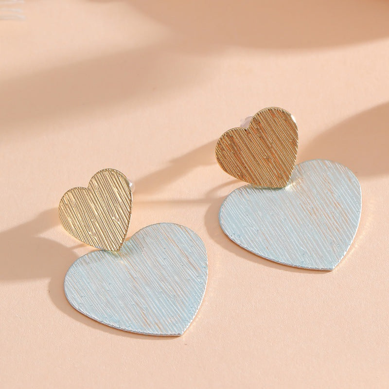Ladies earrings in modern heart design Nin Boutique