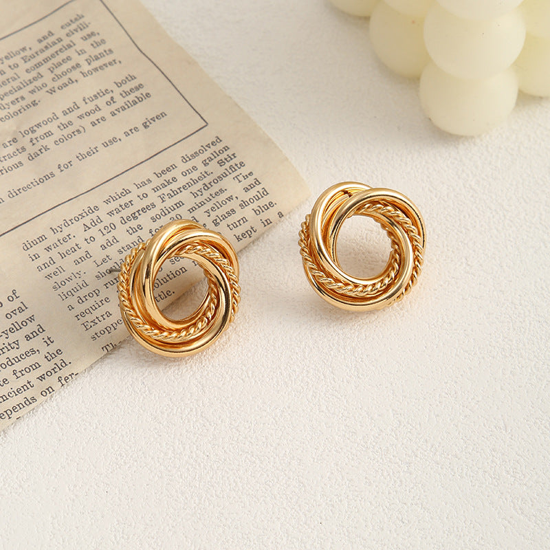 Ladies earrings with elaborate fan design Nin Boutique