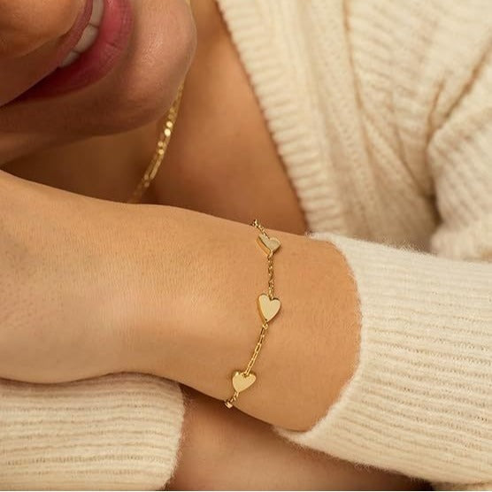 Ladies ankle bracelet with delicate heart pendants and dainty chain design Nin Boutique
